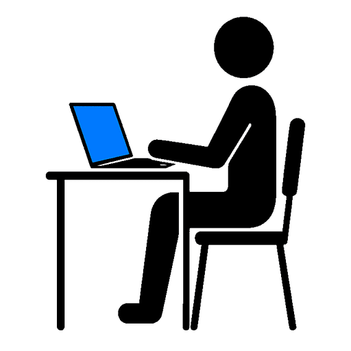 A figure working at a laptop